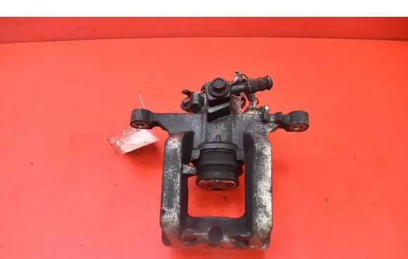 Opel Astra J Rear brake caliper 