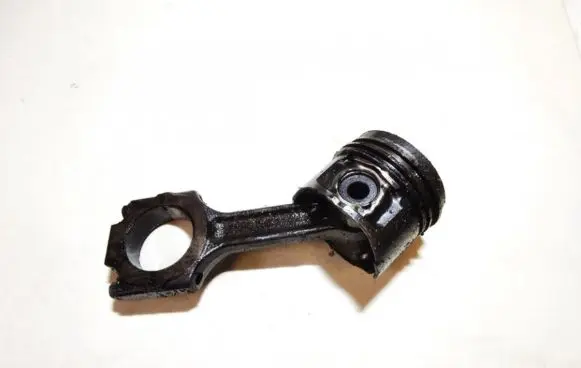 Piston with connecting rod