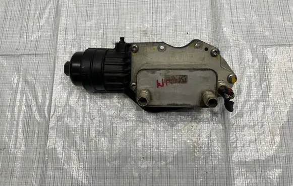 Jeep Wrangler Oil filter mounting bracket 55282624