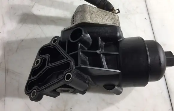 KIA Sportage Oil filter mounting bracket K0100200 264102A300 264002A300