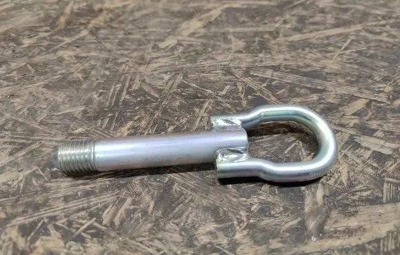 Towing hook eye