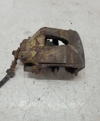 Volkswagen Golf IV Front brake caliper