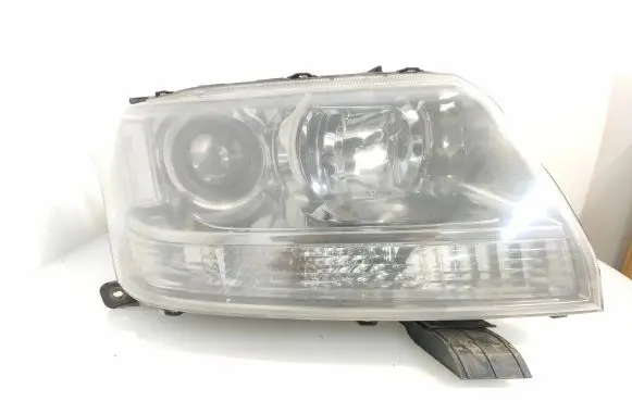 Suzuki Grand Vitara II Headlight/headlamp 10059083