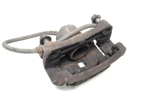 Nissan Juke I F15 Front brake caliper