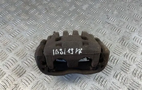 Subaru Impreza III Front brake caliper