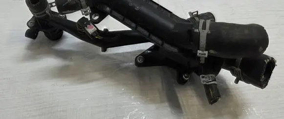 Thermostat/thermostat housing