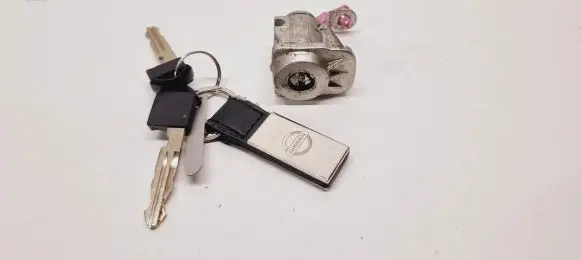 Nissan Pulsar Front door lock (next to the handle) 998104EL1B H0F01DEH0B