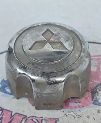 Mitsubishi L200 Original wheel cap MB816581