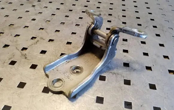 Front door lower hinge