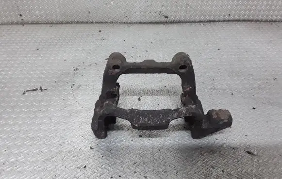 Volkswagen Touran I Brake caliper pad carrier rear 