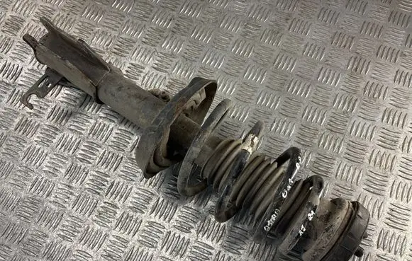 Opel Astra J Front shock absorber with coil spring