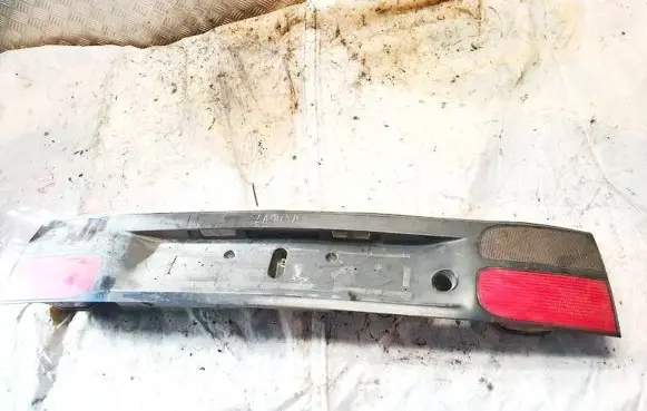 Renault Laguna I Trunk door license plate light bar 7701038277 7700820049