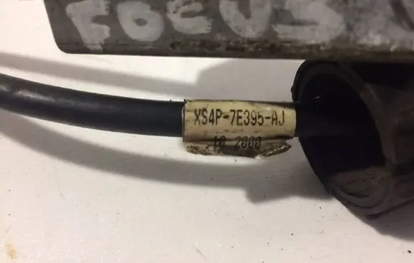 Ford Focus Gear shift cable linkage XS4P7E395AJ