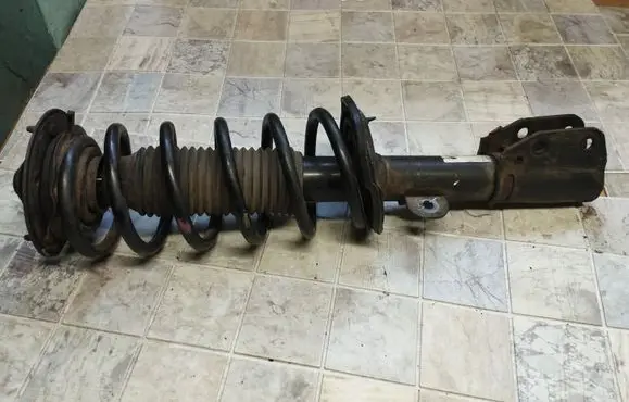 Chevrolet Captiva Front shock absorber with coil spring