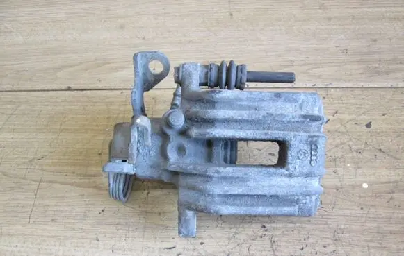 Volkswagen PASSAT B5 Brake caliper pad carrier rear B5F1