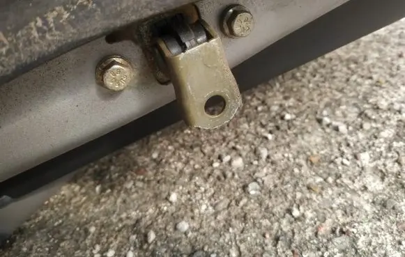 Nissan Primera Front door check strap stopper 