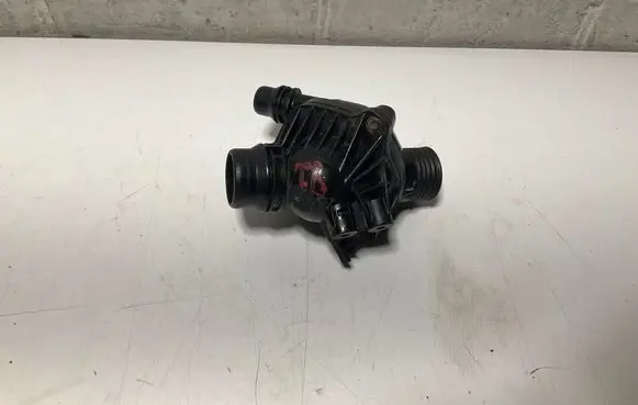 Thermostat/thermostat housing