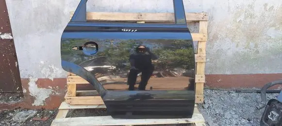 Hyundai Tucson JM Rear door