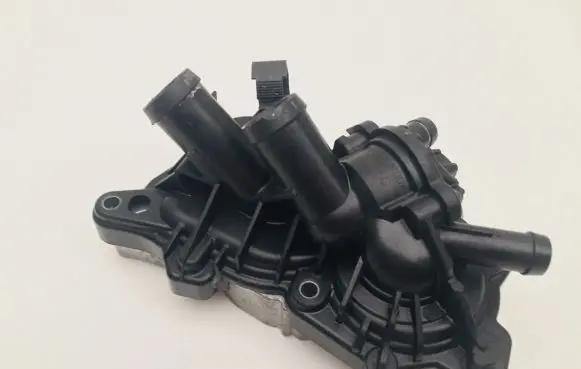 Thermostat/thermostat housing