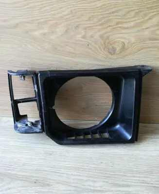 Mitsubishi Pajero Under headlight/headlamp trim 