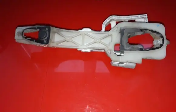 KIA Carens II Front door exterior handle/bracket NOCODE