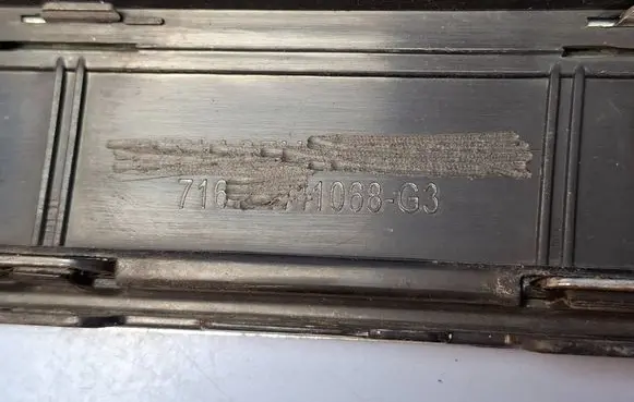 Volkswagen Touareg II Front bumper lower grill 7P6853671E