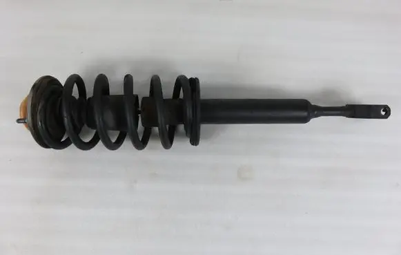 Volkswagen PASSAT B5 Front shock absorber with coil spring