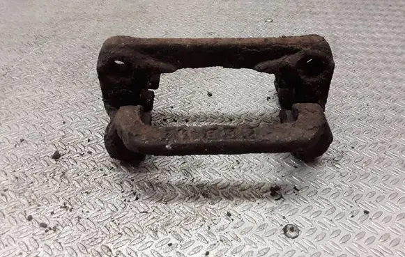 Nissan X-Trail T30 Brake caliper pad carrier rear 