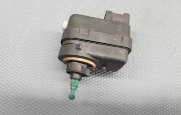 Renault Kangoo I Headlight level adjustment motor 7700424223