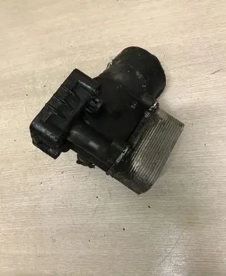 Volkswagen Touran II Oil filter mounting bracket 03L117021C