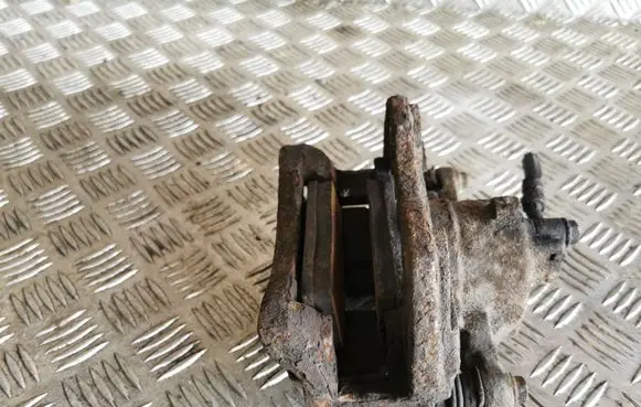 Nissan Almera N16 Front brake caliper