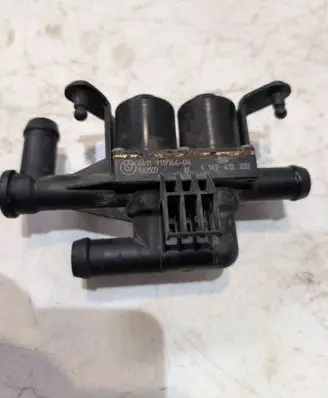 Coolant heater control valve