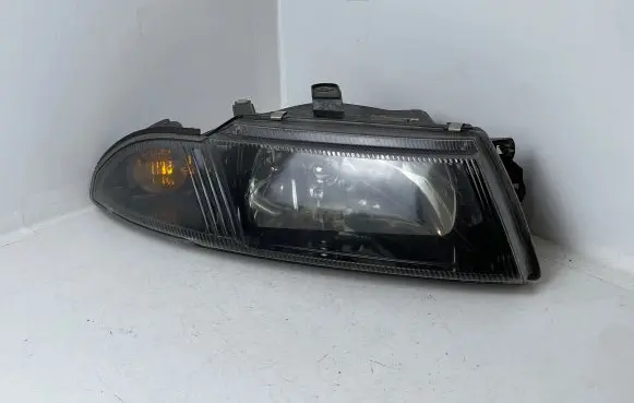 Mitsubishi Carisma Headlight/headlamp 15157800