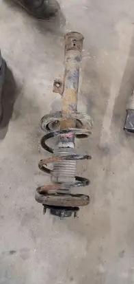 Mitsubishi Outlander Front shock absorber with coil spring