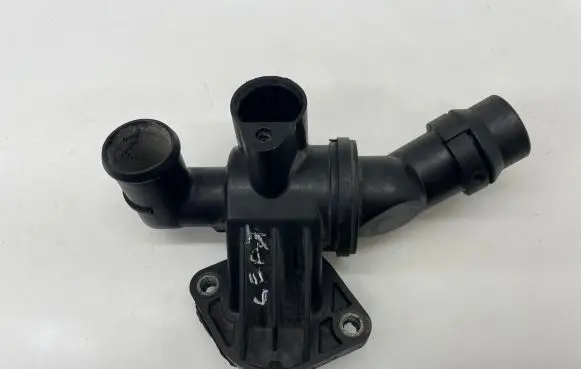 Thermostat/thermostat housing