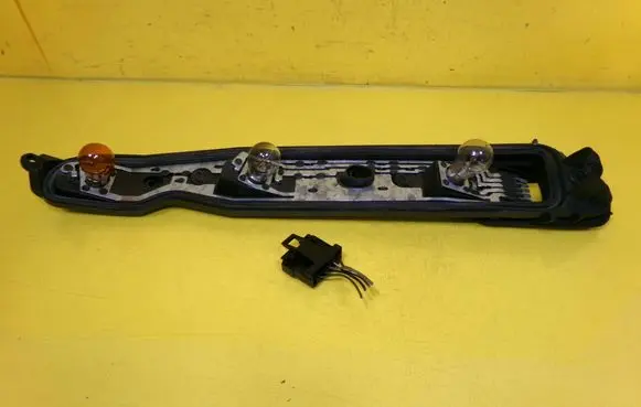 Opel Corsa C Tail light bulb cover holder 