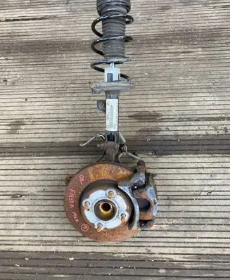 Ford Fiesta Front shock absorber with coil spring 8V5118045BF