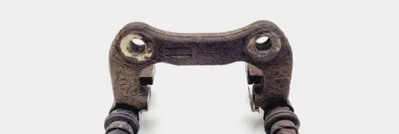 Renault Megane II Brake caliper pad carrier rear 