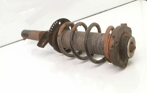 Volkswagen Golf V Front shock absorber with coil spring 1K04130331AF 1K0412331B