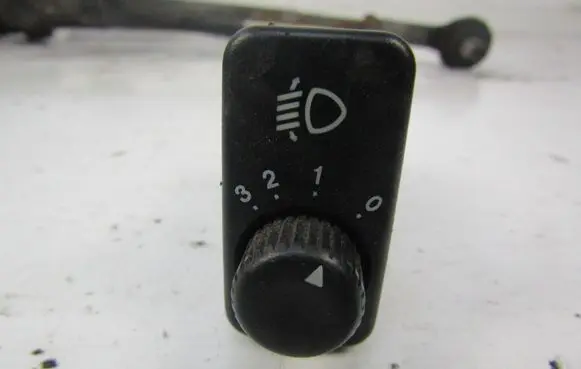 KIA Sephia Headlight level height control switch 