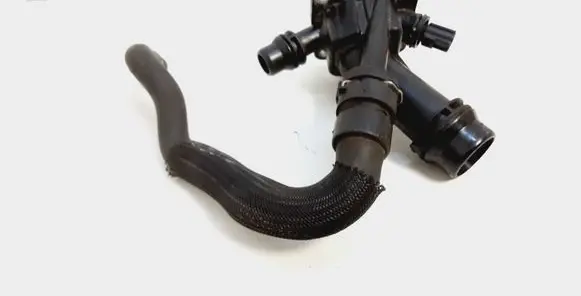 Thermostat/thermostat housing