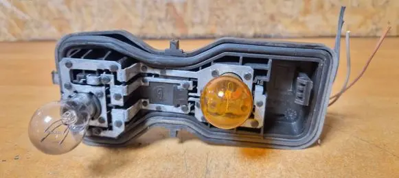 Renault Megane II Tail light bulb cover holder 89026012