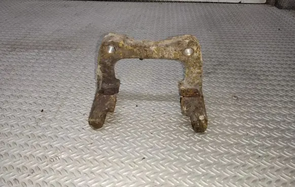 Volkswagen Golf V Brake caliper pad carrier rear 