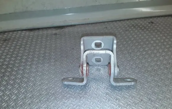 Front door lower hinge