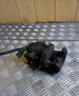 Volkswagen Golf V Front brake caliper