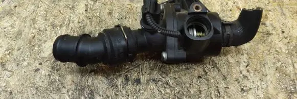 Thermostat/thermostat housing