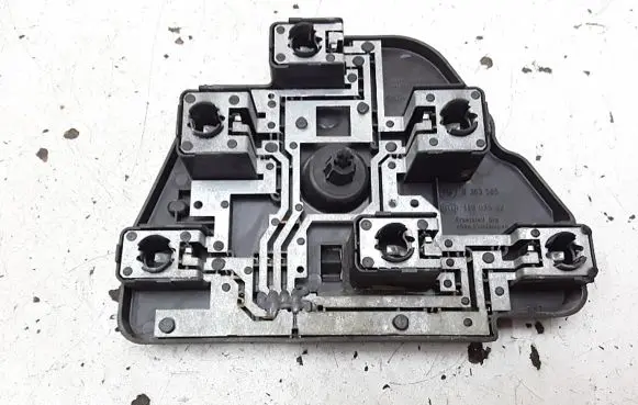 Tail light bulb cover holder