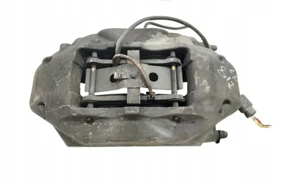 Volkswagen Touareg I Front brake caliper 