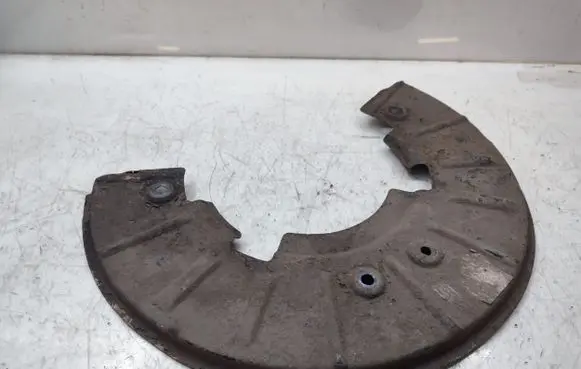 Volkswagen Touareg I Front brake disc dust cover plate 