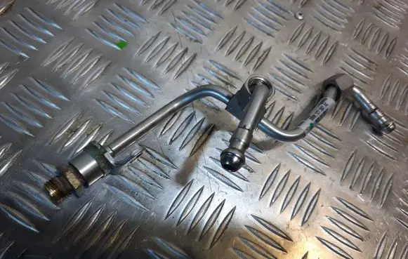 Audi A5 Fuel line pipe 06M127507AC